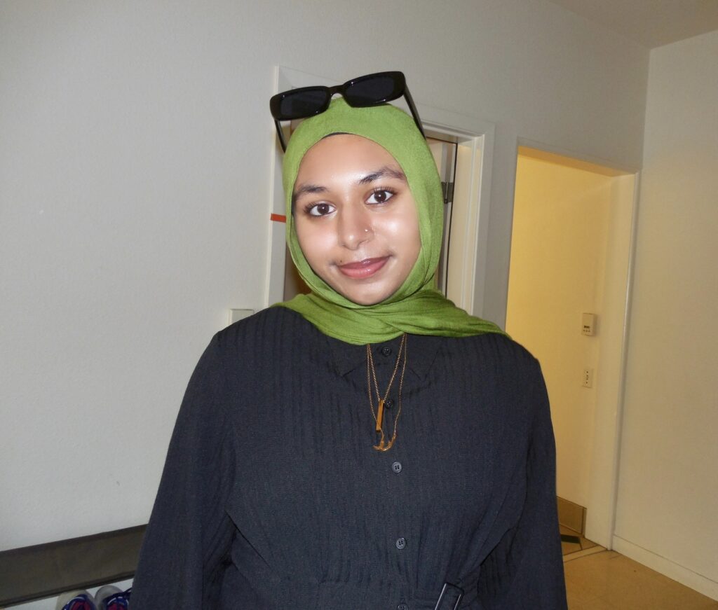 Headshot of Azra Tasneem