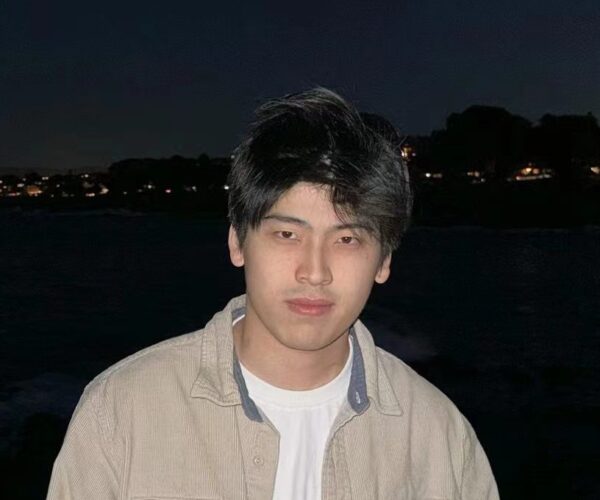 Headshot of Quanjin Su